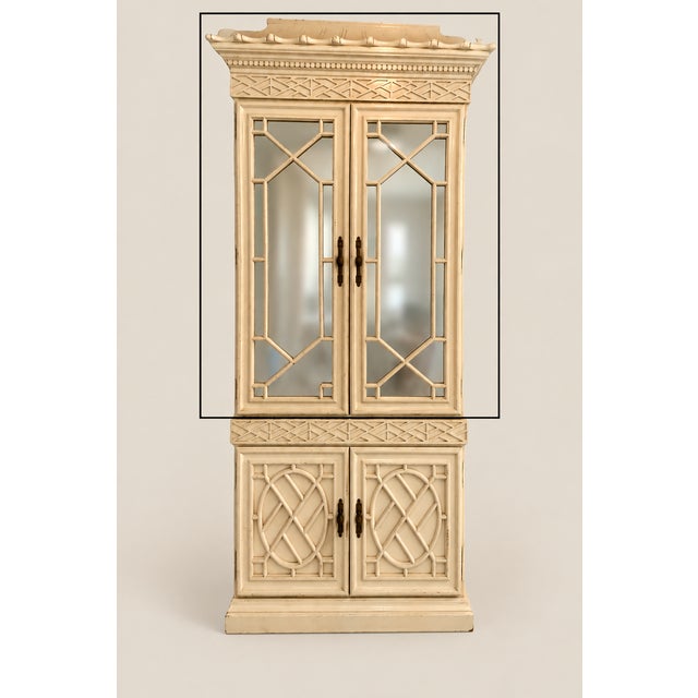 Offered is the top half (hutch) only of this stunning vintage Chinese Chippendale pagoda mirrored cabinet. It is shown in...