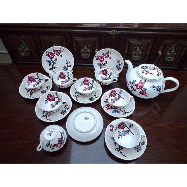 Immerse yourself in French refinement with this magnificent vintage tea set from Bernardaud & Co. Limoges, one of the...