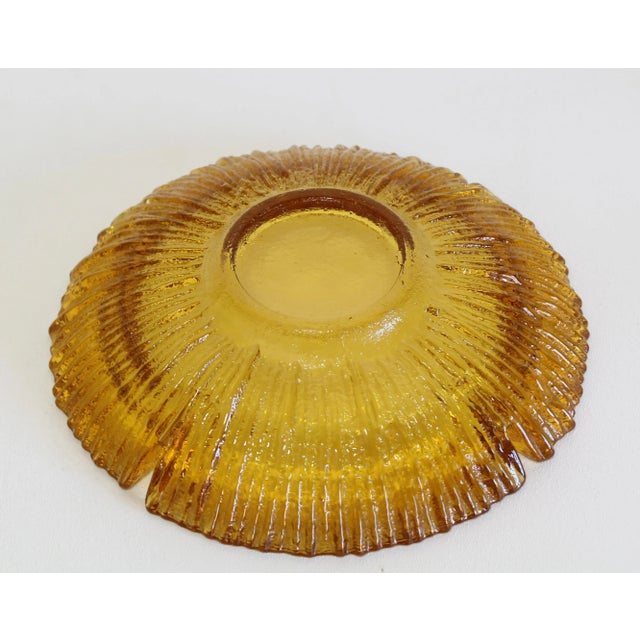 Mid Century amber glass ashtray Dimensions; 9.5" Width x 9.5" Depth x 2" Height See pictures and conditions for reference...