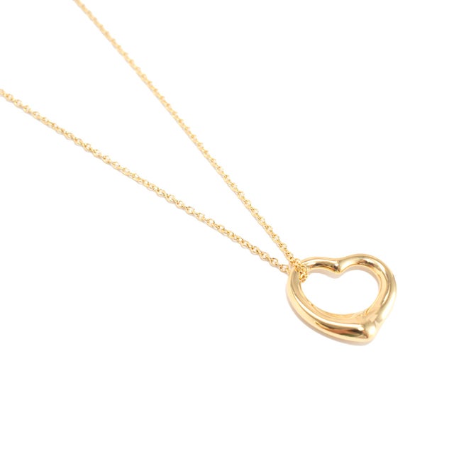 Brand: Tiffany & Co. Gender: Ladies Metal Type: 18K Yellow Gold Length: 16.00 inches Width: 16.00 mm Weight: 4.18 grams...
