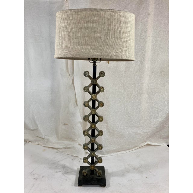 wonderful pair of industrial salvage industrial pieces transformed into lamps. I suspect these were part of a thresher.