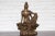 Metal Vintage Bronze Statuette Depicting Quan Yin Seated on a Rocky Formation For Sale - Image 7 of 13