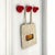 Rare and collectible set of 3 red wall hooks, model 4702, designed by Olaf von Bohr for Kartell in 1972. These hooks...