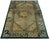 This distinctive early 20th-century Chinese rug features an unusual combination of geometric ornament, stylized floral...