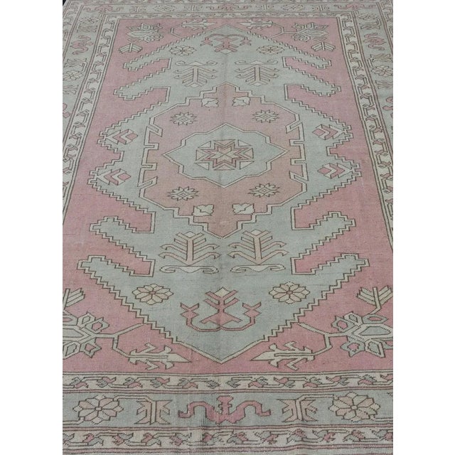 Measures: 6'6 x 9'9 Turkish Oushak Rug in Soft Rose and Sage Green with Geometric 6'6 x 9'9. Keivan Woven Arts / Rug...