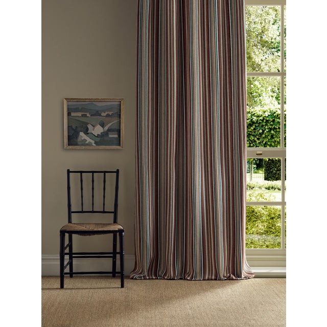 Woodford Stripe features a distinctive checkerboard section inspired by the border details of the Walthamstow design...