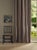 Woodford Stripe features a distinctive checkerboard section inspired by the border details of the Walthamstow design...