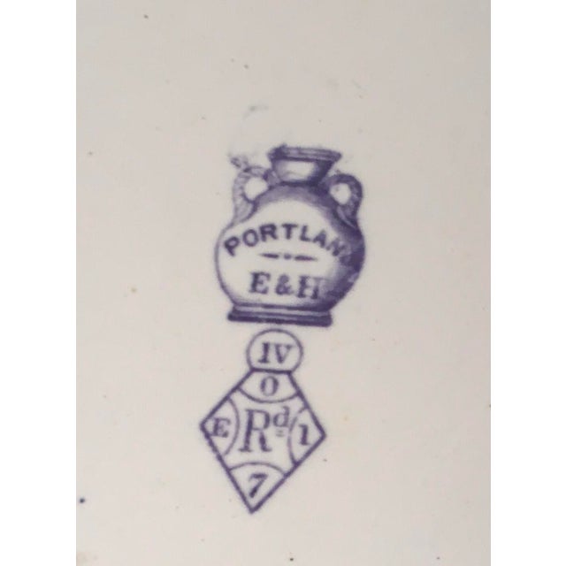A beautiful and unusual 15 1/2”handled purple transfer ware Plate/Platter. The registry mark dates the piece to May, 1862....