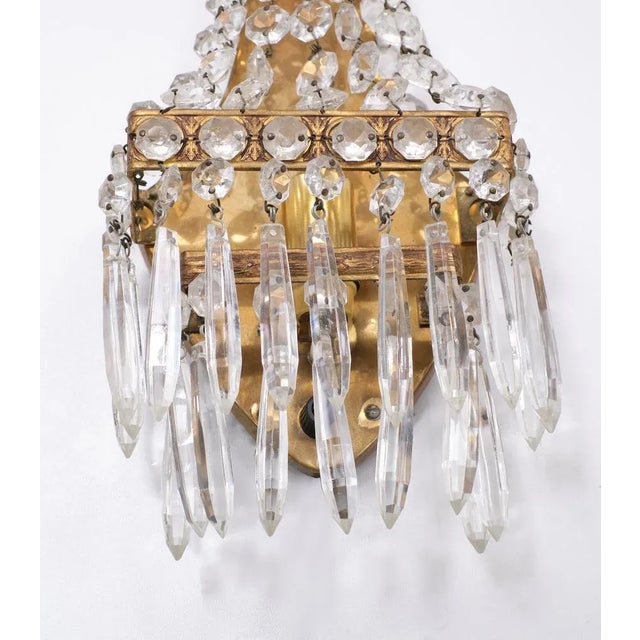 Two lovely romantic Chrystal wall lights, small bulb needed. Push down switch on the brass shield. European Plug (up to...