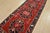 An authentic vintage tribal Caucasian runner hand-knotted with fine wool and natural dyes. This nomadic oriental rug...