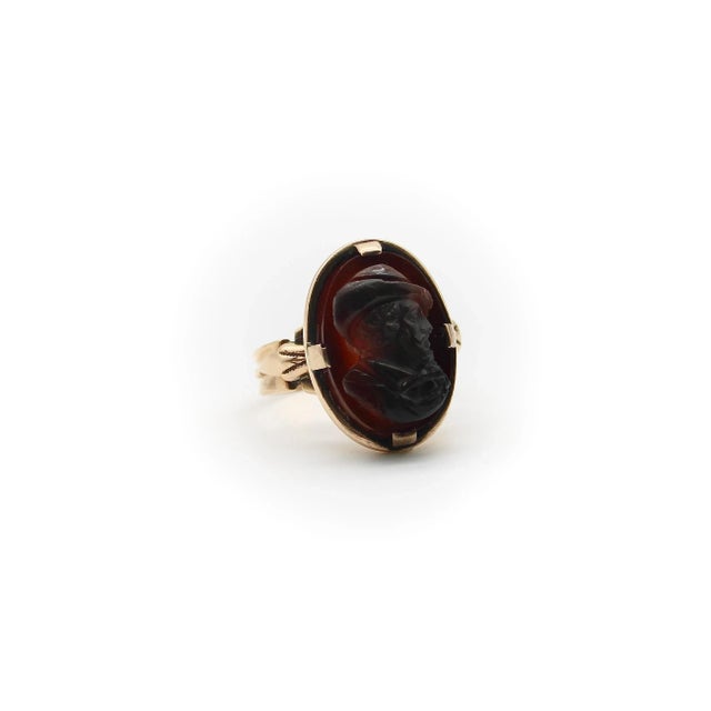 This is part of Chairish’s Fine Jewelry assortment. This remarkable 14k rose gold agate cameo ring features the portrait...
