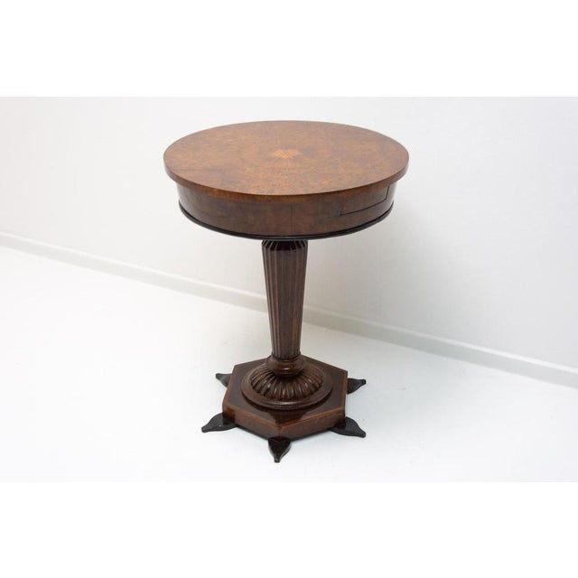 This table was made in Austria-Hungary at the end of the 19th century and is made in a neo-baroque style. It is made of...