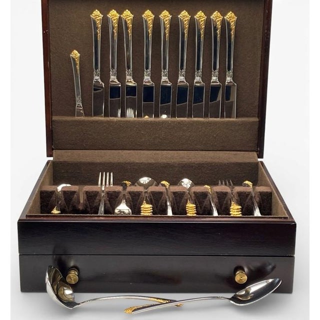 Gorgeous vintage flatware set by the Oneida Silver Company in the iconic (now retired) “Damask Rose” pattern – a graceful...