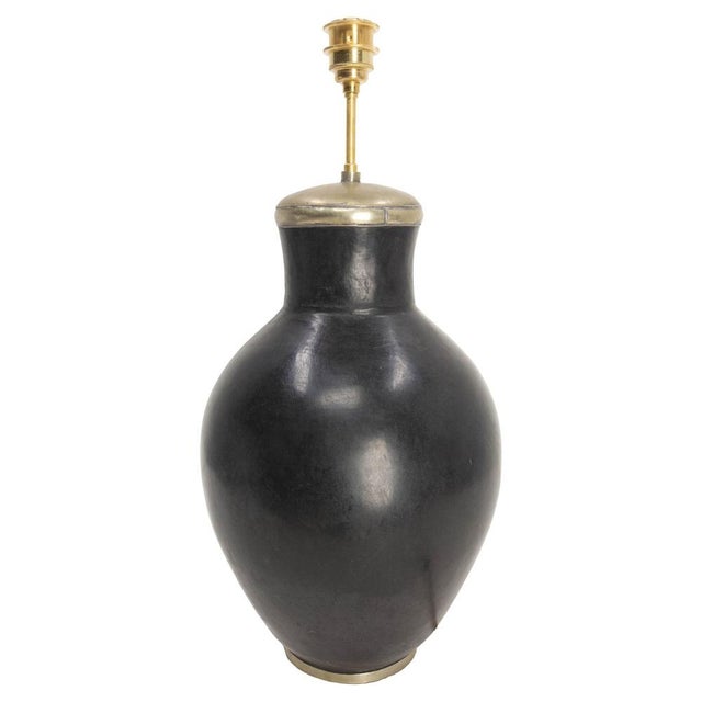 Moroccan vintage table lamp mounted on a terracotta base, with a tadelakt finishing. Lampshade not included but, for...