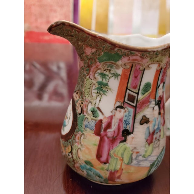 A fine over 150 years old ( guaranteed) possibly 200 years chinese porcelain early rose medallion mandarin ewer. High...