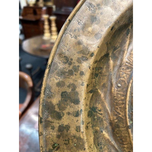 Interesting copper alms dish depicting Adam and Eve in the Garden of Eden in relief. Furthermore, it is possible to...