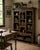 A wonderfully characterful english arts & crafts solid oak bookcase dating from around 1910, featuring the charming carved...