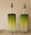A distinctive postmodern decorative lamp featuring a unique sculptural form and a smooth gradient green finish. The design...
