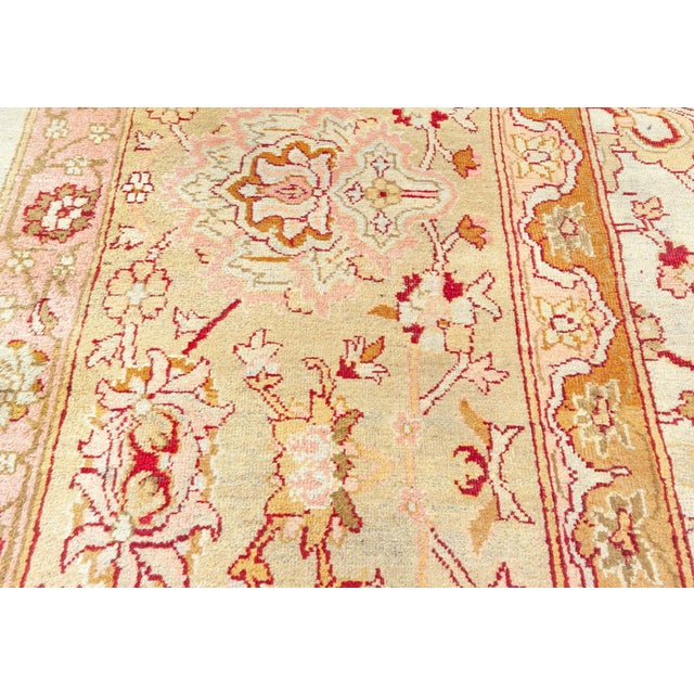 An early 20th century Indian Amritsar antique rug from our Amritsar rugs collection, the sand field with an allover...