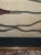 Interesting early 19th century hand colored engraving of surgical tools for use in difficult births. This has a green mat...