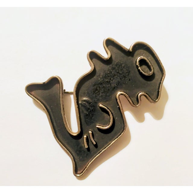 Here's a fine example of Mexican Modernism circa 1940s-1950s. This sterling brooch signed Cortes features a very Picasso-...