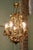 French Toleware Gilt and Ceramic Flower 5-Bulb Chandelier, 1930 For Sale - Image 3 of 8