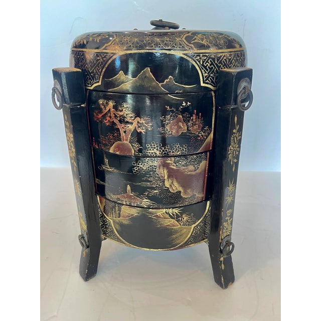 Just in, this Chinese Three Tiered Black & Gold Lacquer Wedding Basket, 19Th Century This Chinese or Japanese three tiered...