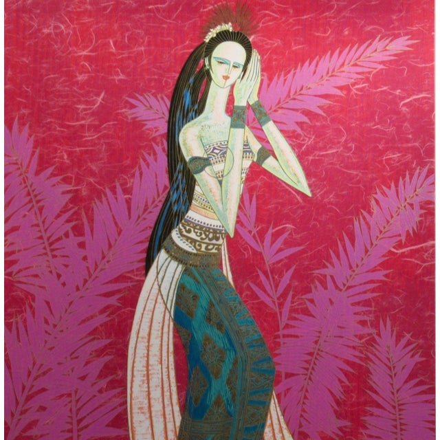 This artwork titled "Bali Princess" variant red, 1996, is an original color serigraph on thin rice paper taped to a sheet...