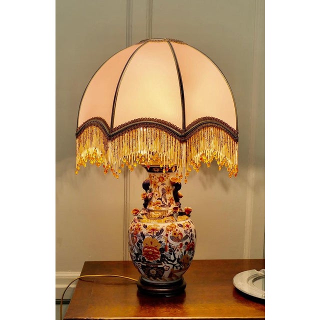 A Very Lovely Famille Rose Vase Lamp This is an exquisite piece, the Vase has hand made ceramic roses set around the neck...