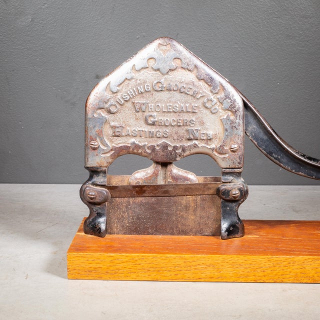 ABOUT An antique cast iron tobacco plug cutter used in general stores during the late 19th and early 20th centuries to...