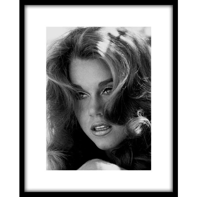 Jane Fonda, 1966. 11" x 14" silver gelatin fiber based print signed on verso by photographer Gene Trindl. #02 of an open...