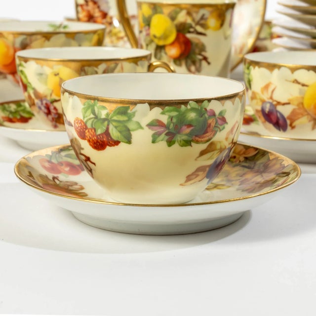 Beautifully hand Painted Porcelain Dessert Set Marked BHA (37 pieces). Set includes 11 Small Plates, 12 Tea Cups...