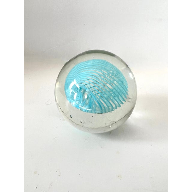 A beautiful clear glass paper weight with a Tiffany Blue Swirl of glass - the perfect size and could be a paperweight for...