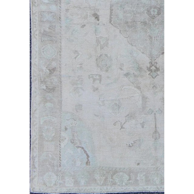 Turkish Muted Layered Medallion Vintage Turkish Oushak Rug in Taupe, Lt Blue, and Brown For Sale - Image 3 of 7