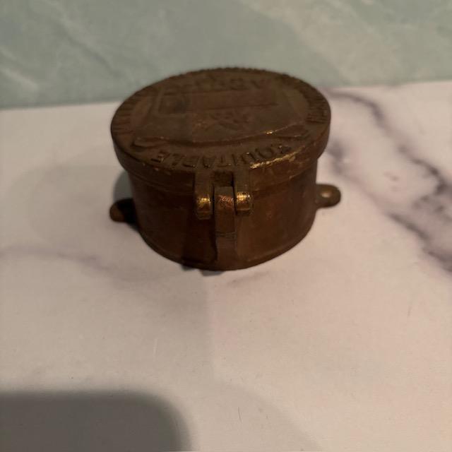 Antique water meter cover. Made of brass. Installed in Pittsburgh, Pennsylvania. Made by the Equitable Meter Company,...