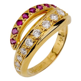 1990s Cartier Diamond Ruby 18k Yellow Gold Bypass Band, Size 5 For Sale