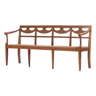 18thc Italian Walnut Directoire Bench Having a Cord Seat and Open Arms For Sale
