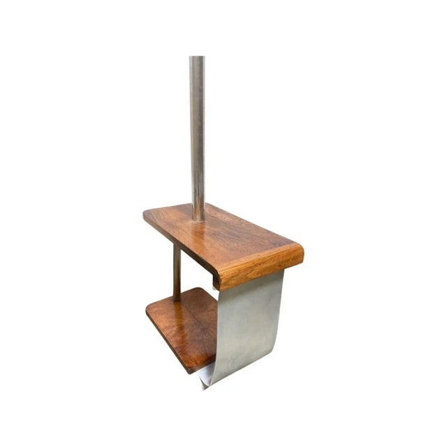 A rare original art deco side table with built-in chrome torchiere floor lamp. This table features 2 tiers of sculpted...