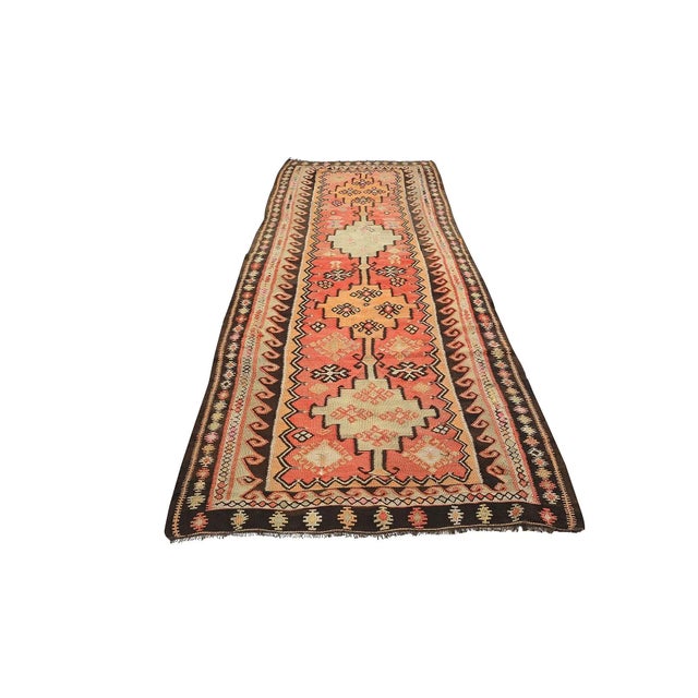 Vintage handwoven wool kilim rug from Kars region of Turkey. Approximatelly 50-60 years old. In very good condition.