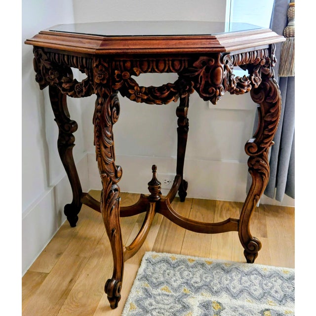 Elevate any room with this exquisite Victorian style accent table, showcasing masterful ornate hand-carved detailing...