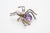 This is a fun opal, amethyst and diamond spider brooch. It is set in yellow gold and silver. The opal is a round cabochon...