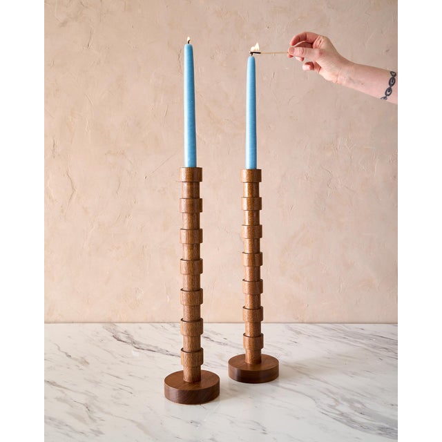 These gorgeous Walnut Candle Holders are each hand turned in a small wood shop in Pennsylvania. Reminiscent of Mid-Century...