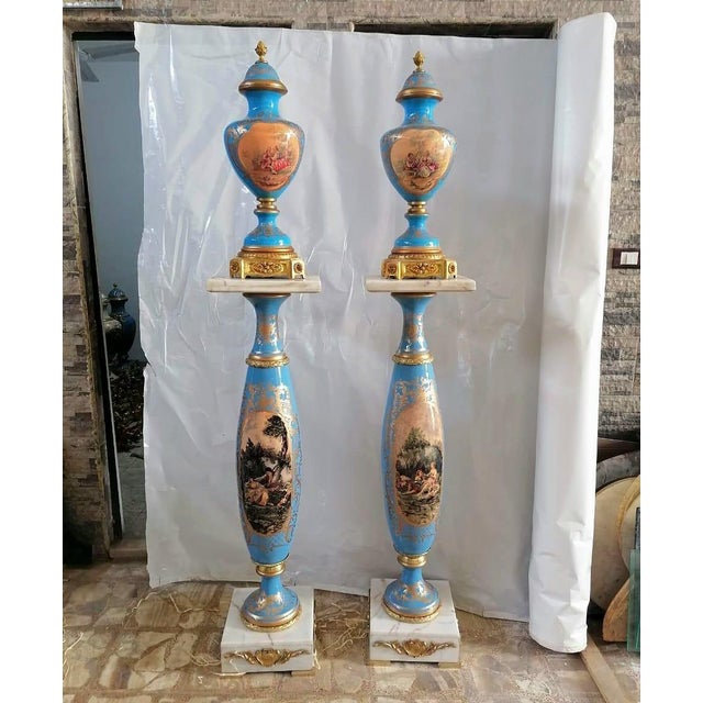 Make a striking statement with this grand decorative vase and pedestal, featuring an elegant combination of celestial...