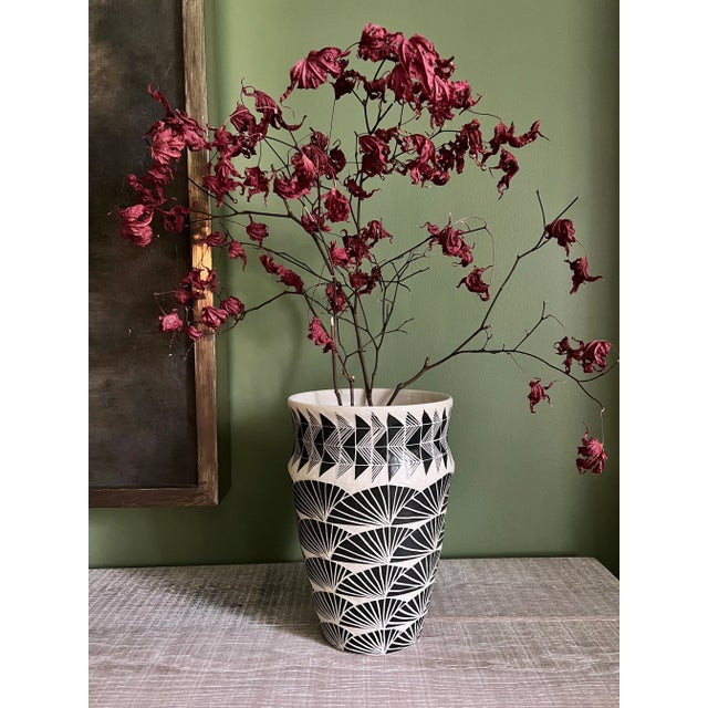 Carved glaze in Black and White. Fan pattern repeating and an inspired flying geese element. Hand-thrown porcelain from...