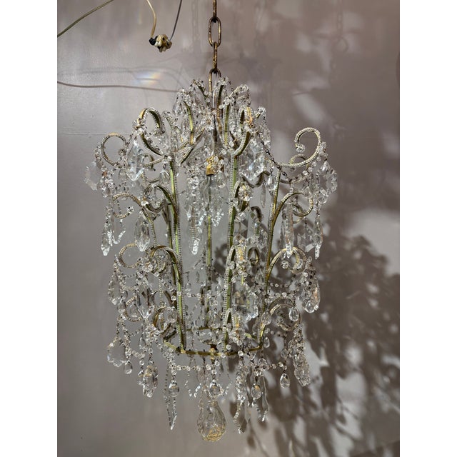 Refined and highly decorative Italian chandelier from Florence, dating to the 1950s. The piece exemplifies the celebrated...