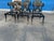Modern patio Klismos style dining chairs. Set of 6 . The chairs are done in iron with a matte black finish. The chairs...