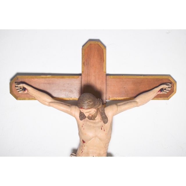 This monumental wooden crucifix, standing 230 cm tall, is an impressive devotional piece of great age, likely dating from...