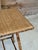Charming antique bamboo side table or plant stand featuring a newly added woven rattan top with coordinating rattan trim....