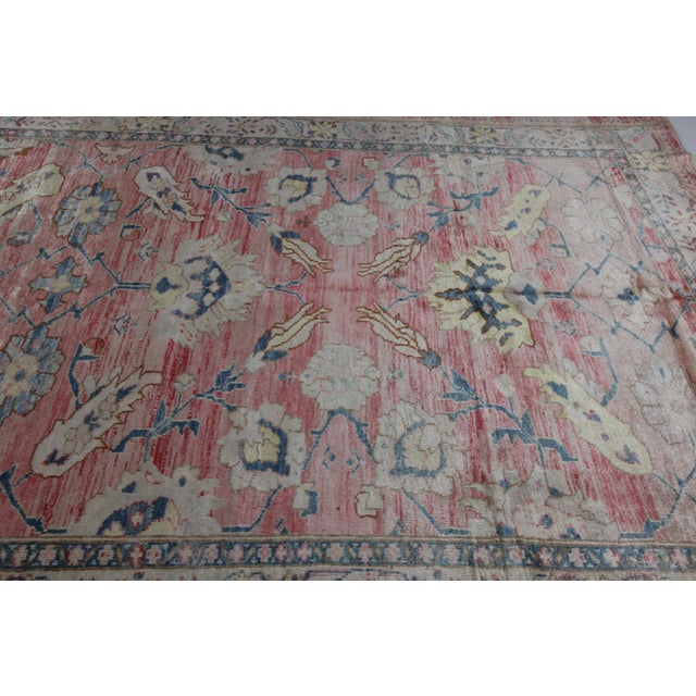 This listing is for an exceptional vintage handmade Turkish rug coming from Oushak. The age of this sweet carpet is...