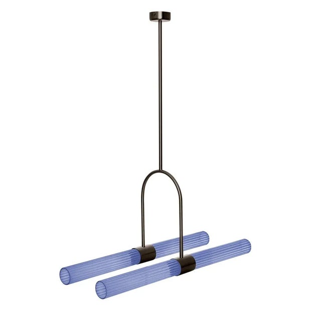 Sbarlusc pendant lamp by Luce Tu. Dimensions: 71.4 x 35-75 cm. Materials: brass and glass. State-of-the-art technology and...